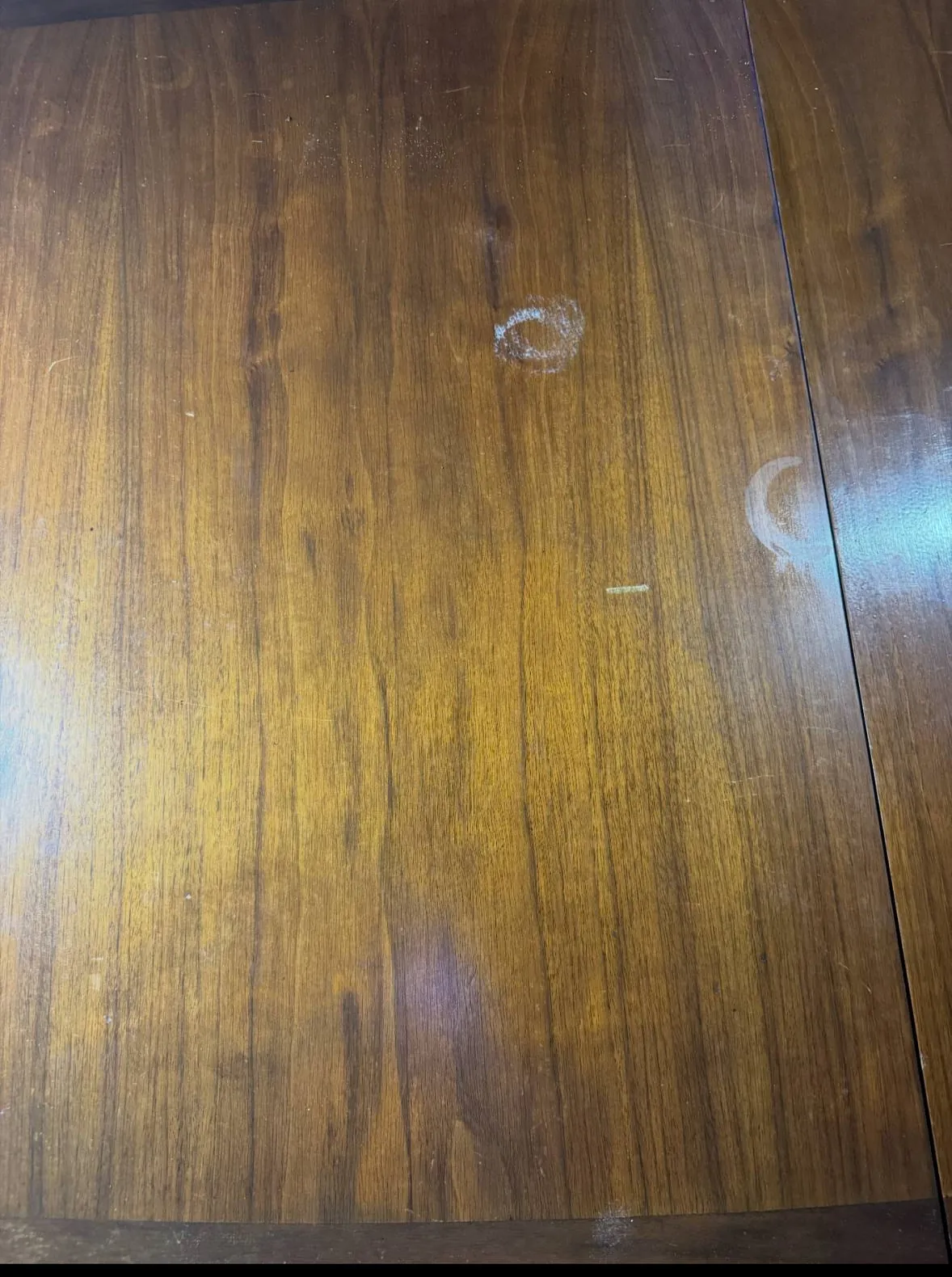Before photo showing a white cup ring and cloudy marks in the soft sticky polyurethane finish