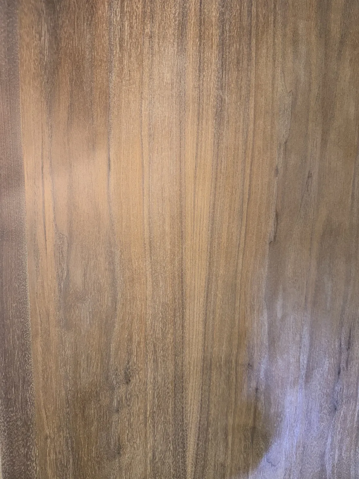 Wood table surface after old polyurethane was removed and sanded