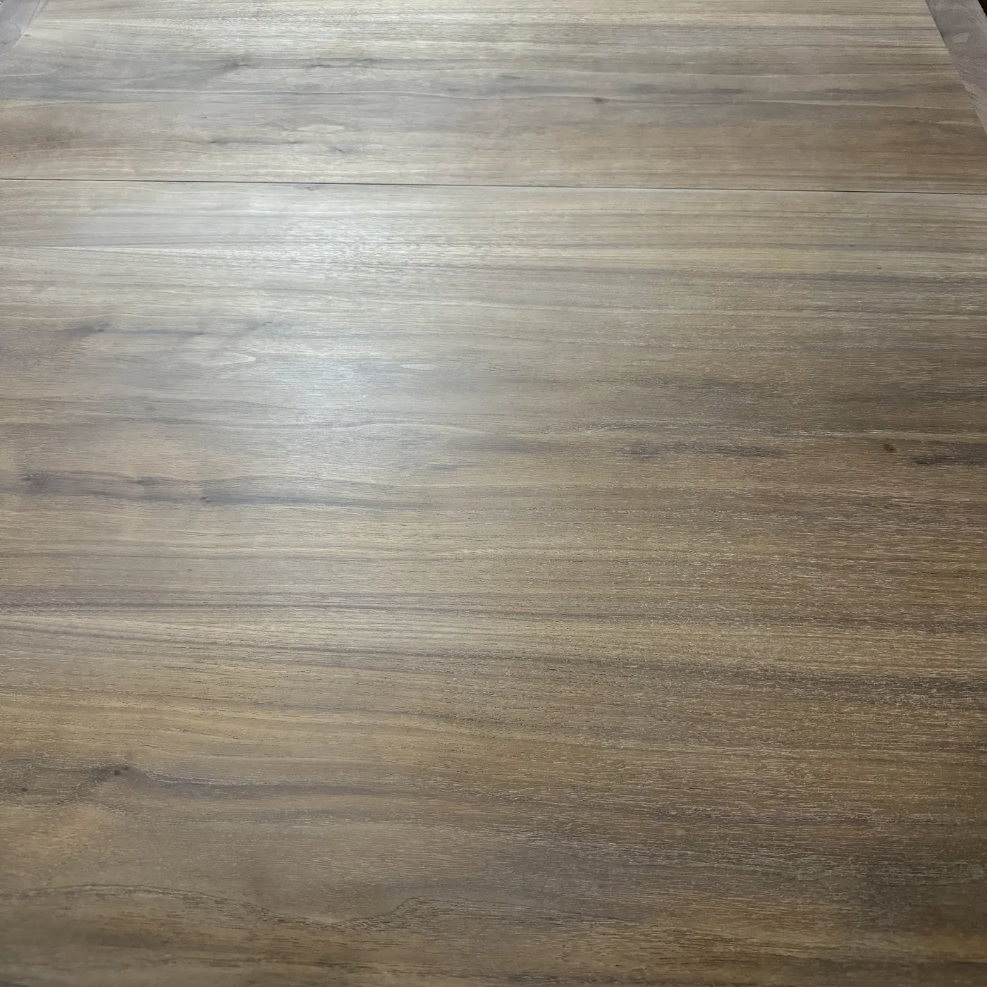 Wood table surface during stain color check before final polyurethane