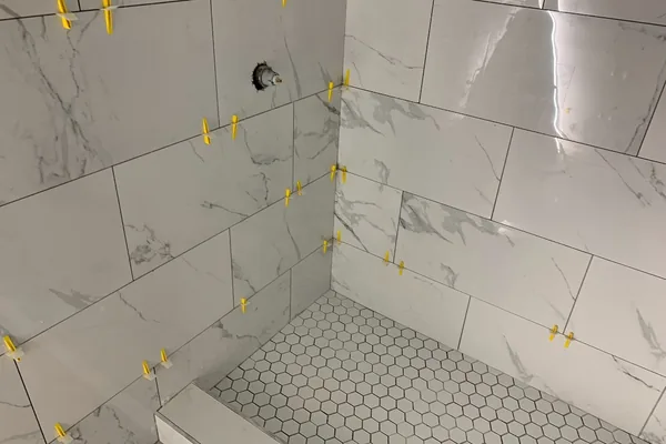 Bathroom Build-Out From Rough Plumbing to a Tiled Marble Shower in Queens