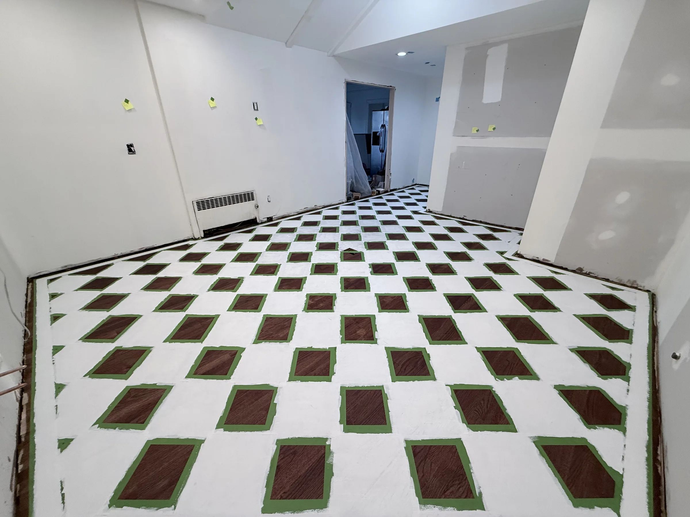 Tape removed the same day, revealing a crisp painted checkerboard pattern