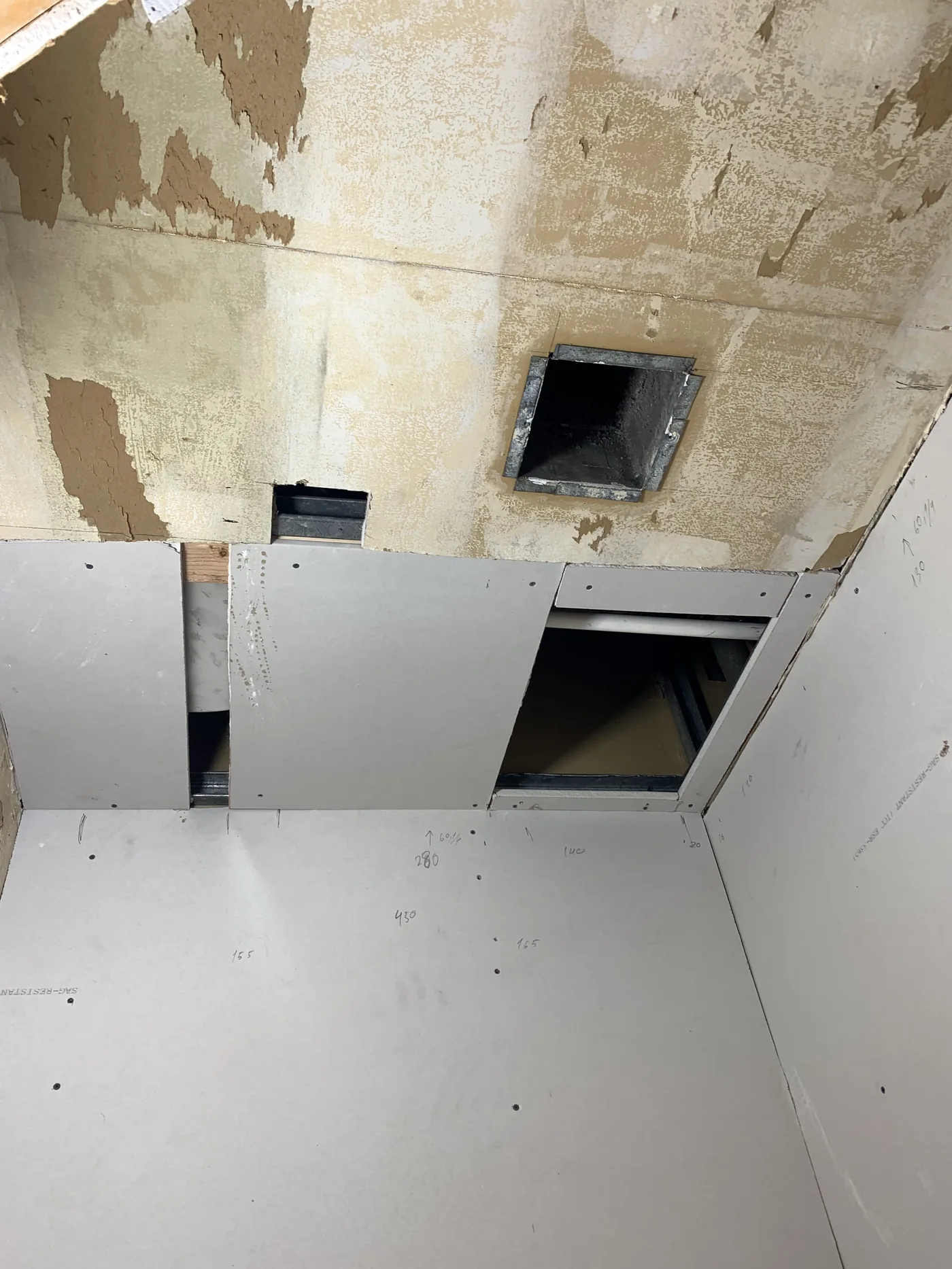 Ceiling areas were opened and repaired after an upstairs water leak
