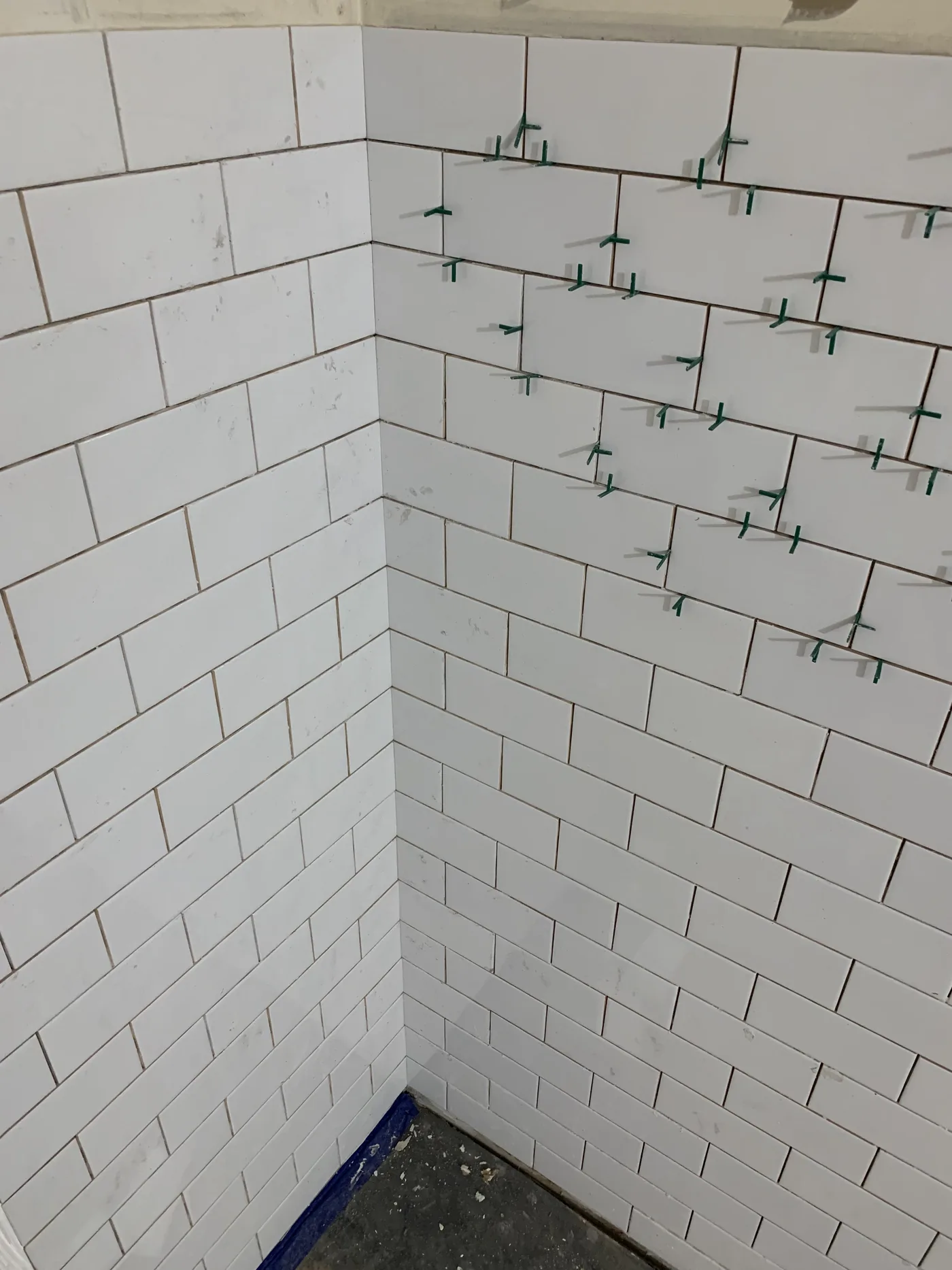 Tile details tying together the wall and floor finishes