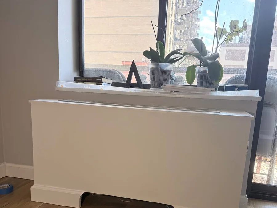 A Custom AC Cover Box and Flood-Damaged Wall Repair in a NYC High-Rise