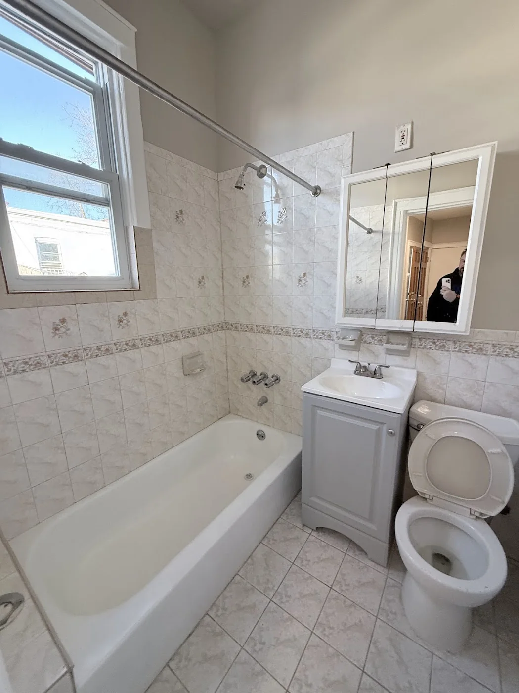 Finished bathroom after refresh with vanity tub and fixtures