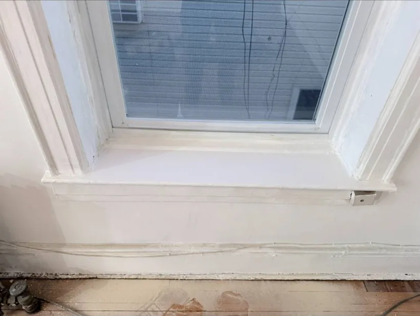 Window sill after primer and paint