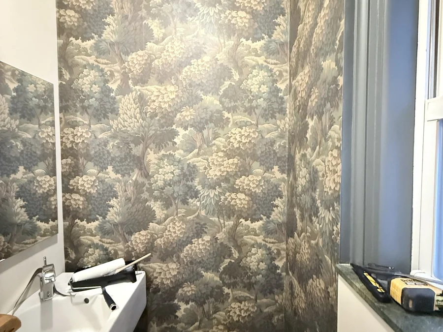 A Bold Botanical Wallpaper Powder Room on the Upper West Side
