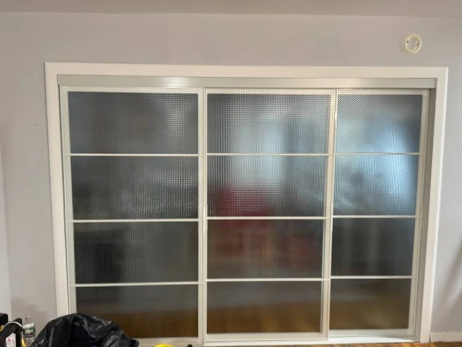 A Solid Wall Opened Up for Sliding Glass Doors in DUMBO, Brooklyn