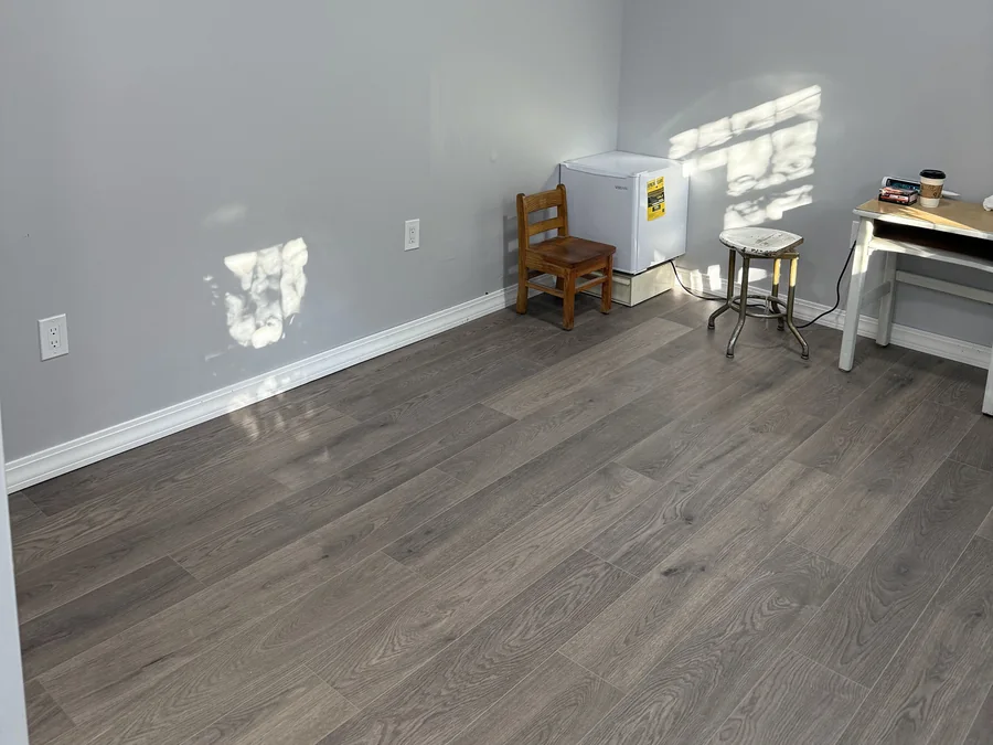 An Uneven Floor Leveled with OSB and Finished in Vinyl Plank in Hollis, Queens