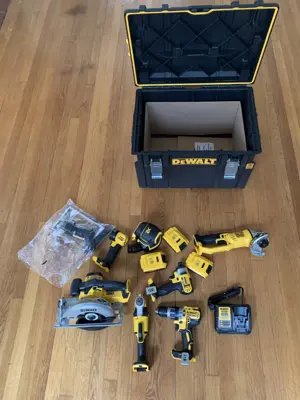 DeWalt professional tool kit with circular saw, drill, impact driver, and TOUGHSYSTEM toolbox