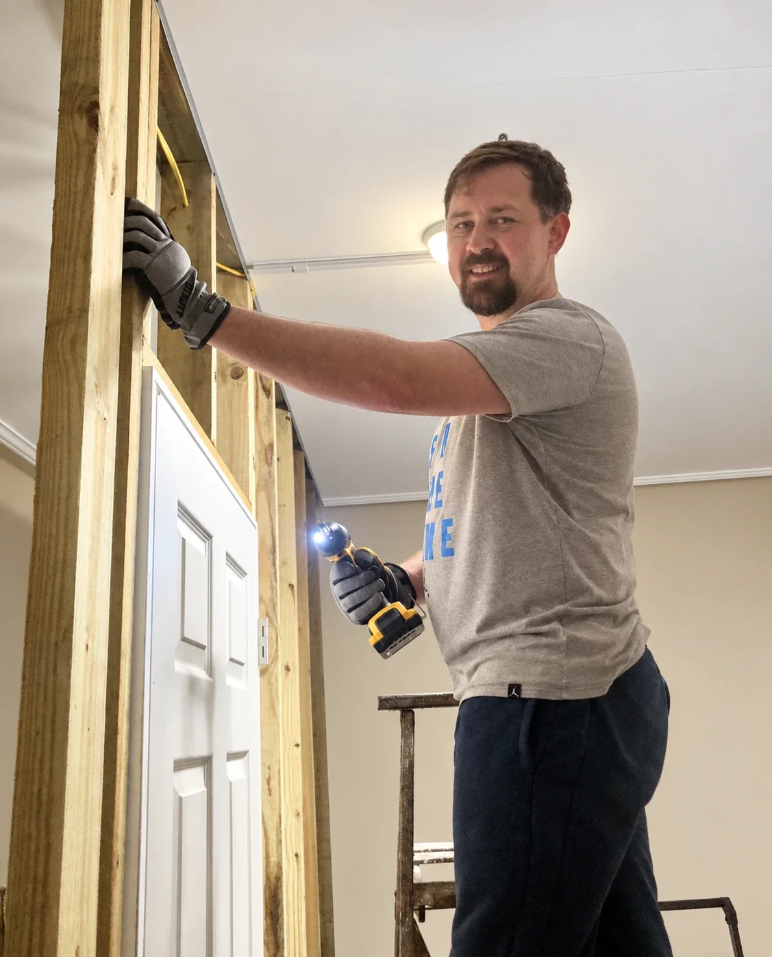 Repair ASAP technician framing a new doorway